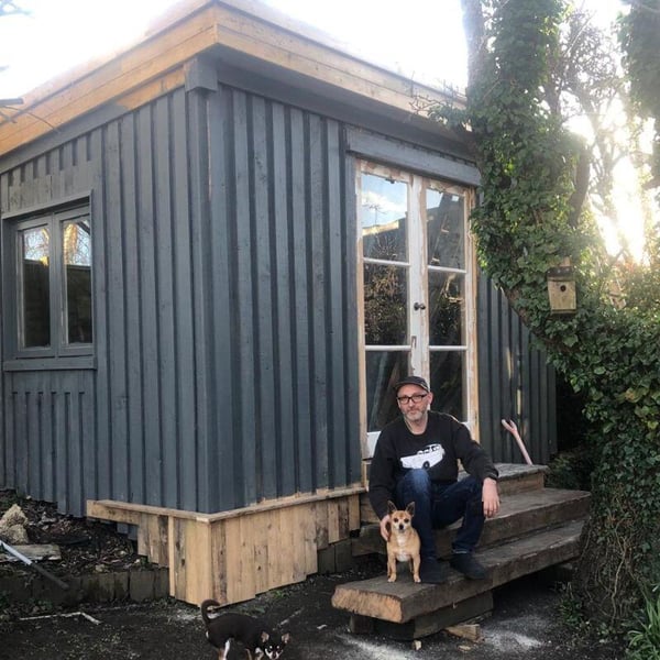 Steve Bannatyne in front of the art studio he built himself